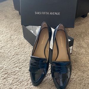 Black patent loafers, synthetic uppers. New with box woman’s 8M
